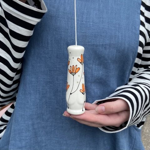 Orange daisy ceramic light pull