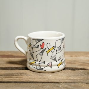 Small nursery mug with seagulls and hearts design, by The Cutting, Gallery Thea